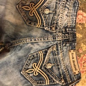 Rock Revival Women’s boot cut jeans.  Size 25 waist.